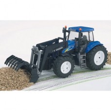 TRAKTOR NEW HOLLAND Z NAKLADALCEM